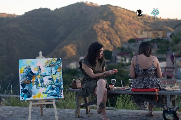 Partecipanti e opere dipinte all’aperto a Calanna